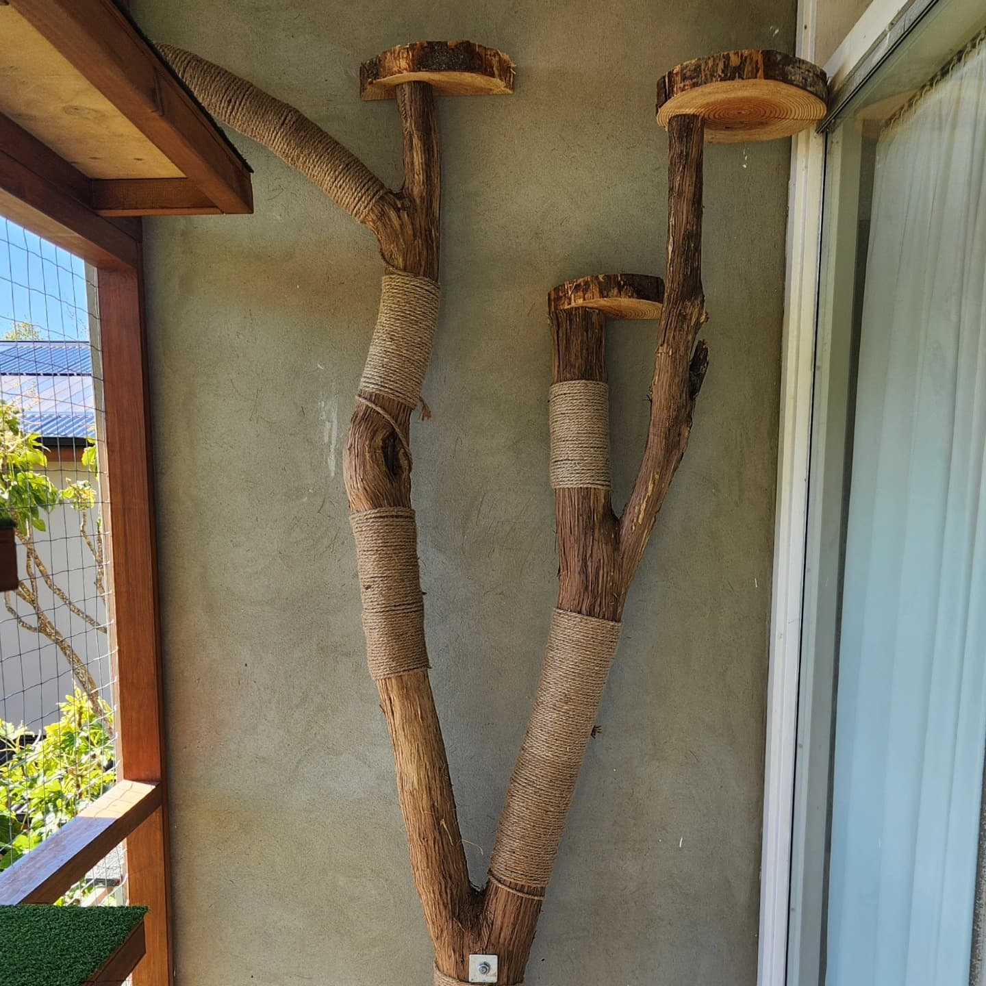 Natural branch climbing post with rope wrapping